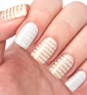 Модный маникюр: золото и полоски